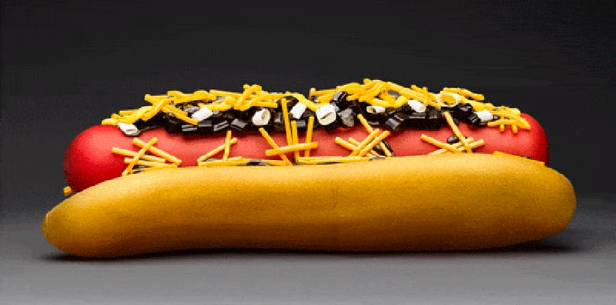 John Miller, Chili Dog, 2024. Blown and hot sculpted glass, 32 x 10 x 11 inches. Photo: Aric Attas © John Miller